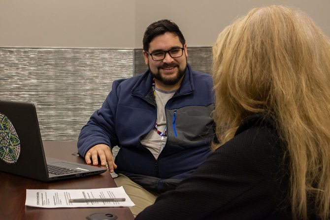 Community-Health-Worker Community health worker talking with patient