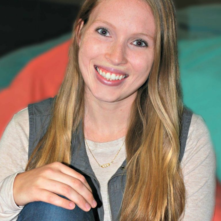 T.Masters_18f Woman smiling with long blonde hair