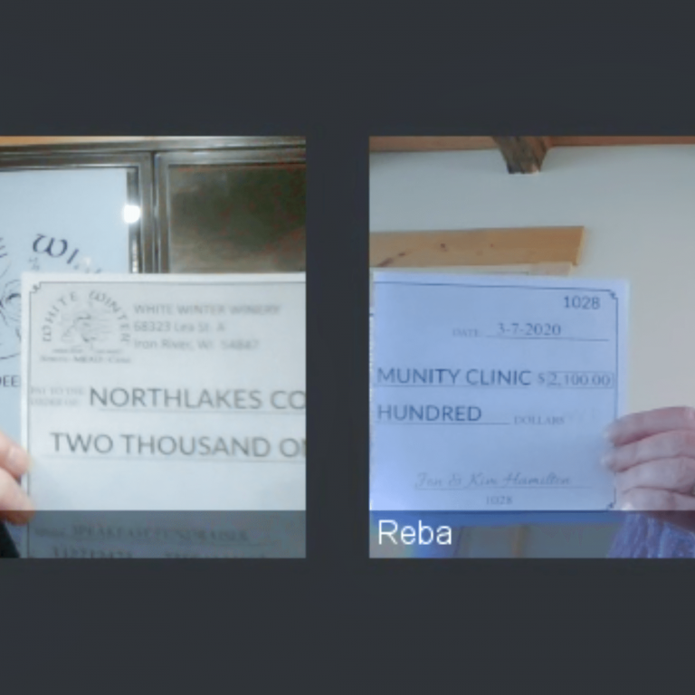 WWW-NLCC-Check-1 Two women on online meeting holding up a check