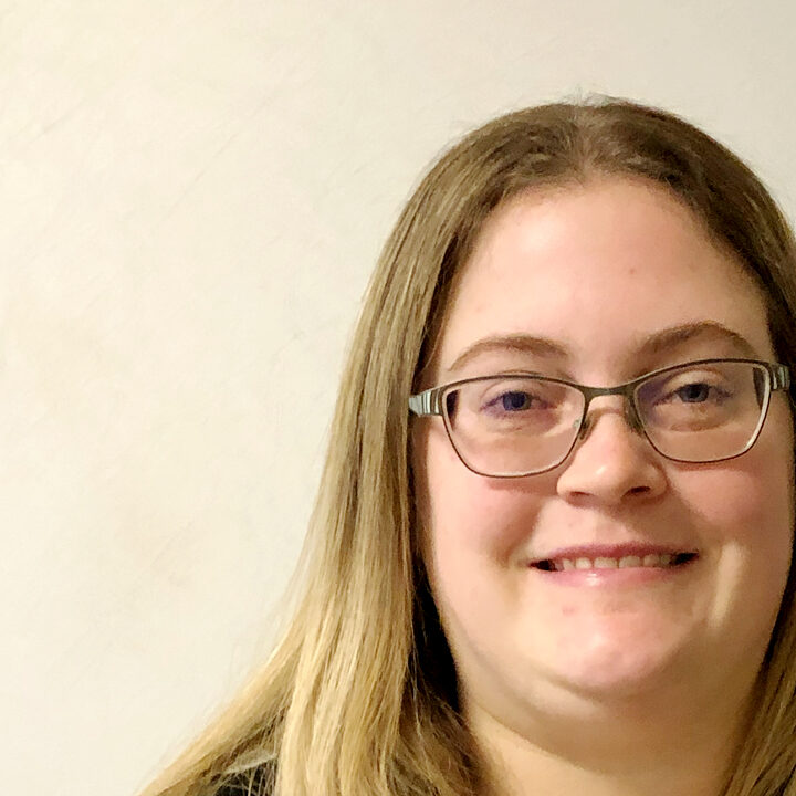 Kaleena-Vander-Wyst-Blog-Photo Headshot of woman with dark blonde, straight hair and glasses