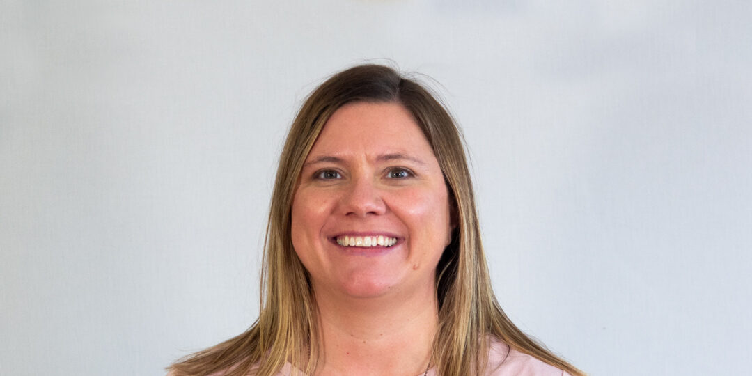 Angela-Lunn-1080×720 Headshot of woman with light pink shirtand shoulder length blonde hair smiling