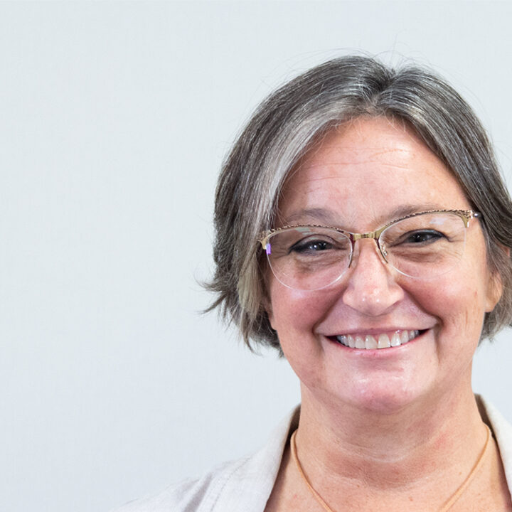 Tamilyn-White-Blog-Post-1080×720-1 Headshot of woman smiling with glasses and short hair