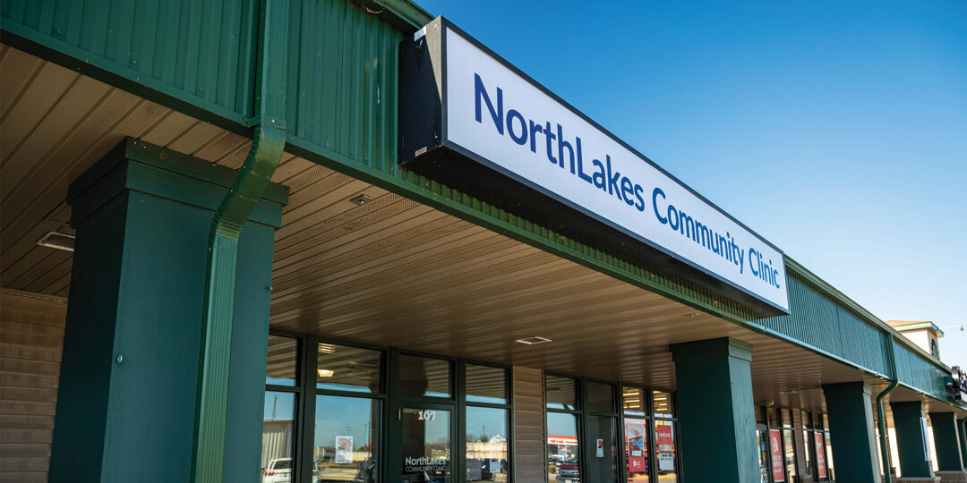 Exterior of street mall type of building with NorthLakes Community Clinic sign over it