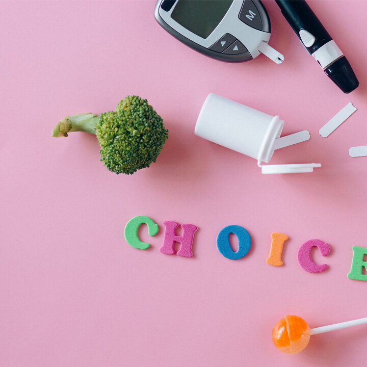 NorthLakes-Offers-Diabetes-Prevention-Program Broccoli, suckers, and glucose monitor on pink background with the word "choice"