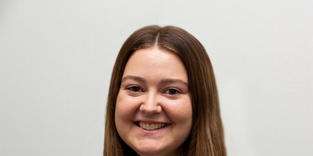 Alexis Carlson Provider Photo Featured Image Headshot of woman smiling with long brown hair