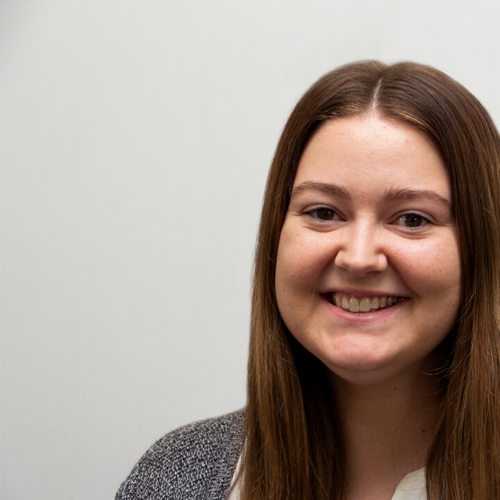 Alexis Carlson Provider Photo Featured Image Headshot of woman smiling with long brown hair