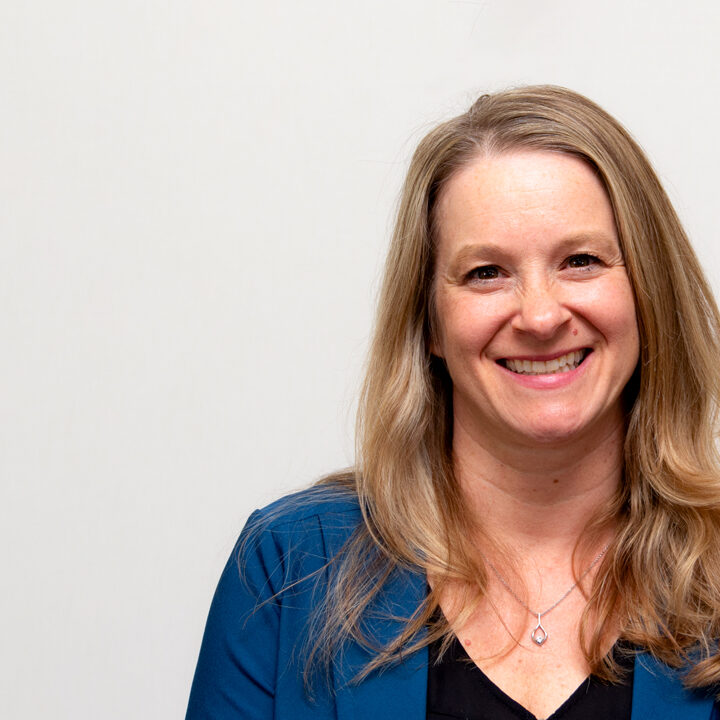 Amy Saarnio Wyka Featured Image Headshot of woman smiling with long blonde hair and blue blazer