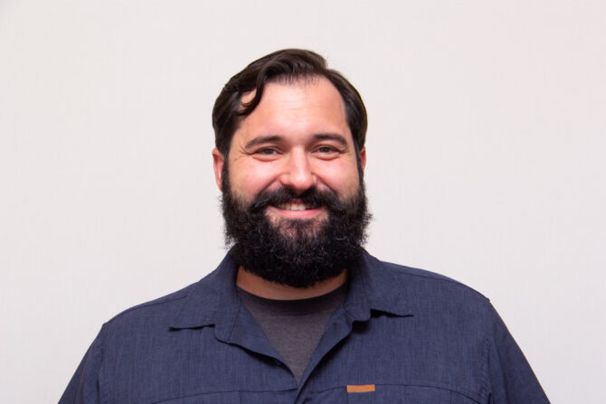 Matt-Digirolamo-Featured-Image Headshot of man with dark hair and beard