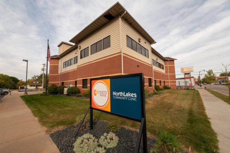 Outside of large, tall brick building