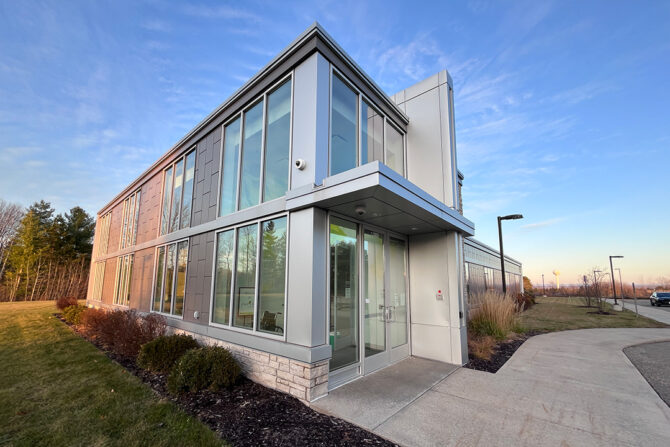rice-lake-west exterior of a building with a glass wall