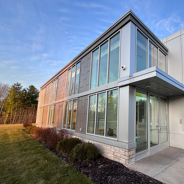 rice-lake-west exterior of a building with a glass wall