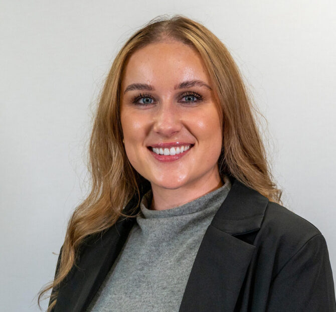 Woman with long blonde hair and light eyes