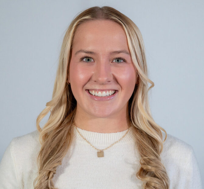 Headshot of woman with long blonde hair