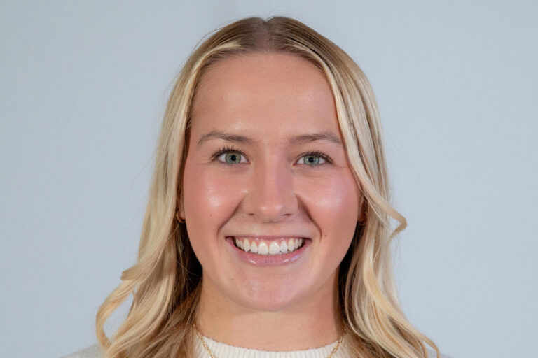 Headshot of woman with long blonde hair