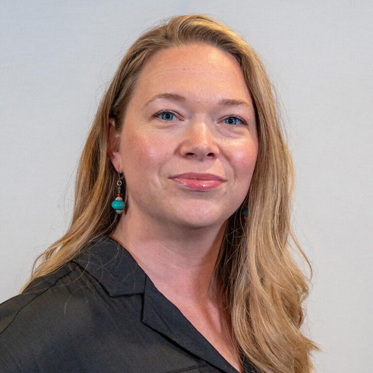 Amber-Johnathan NorthLakes Headshot of a woman with long blonde hair and blue eyes next to a headshot of a man with glasses and beard