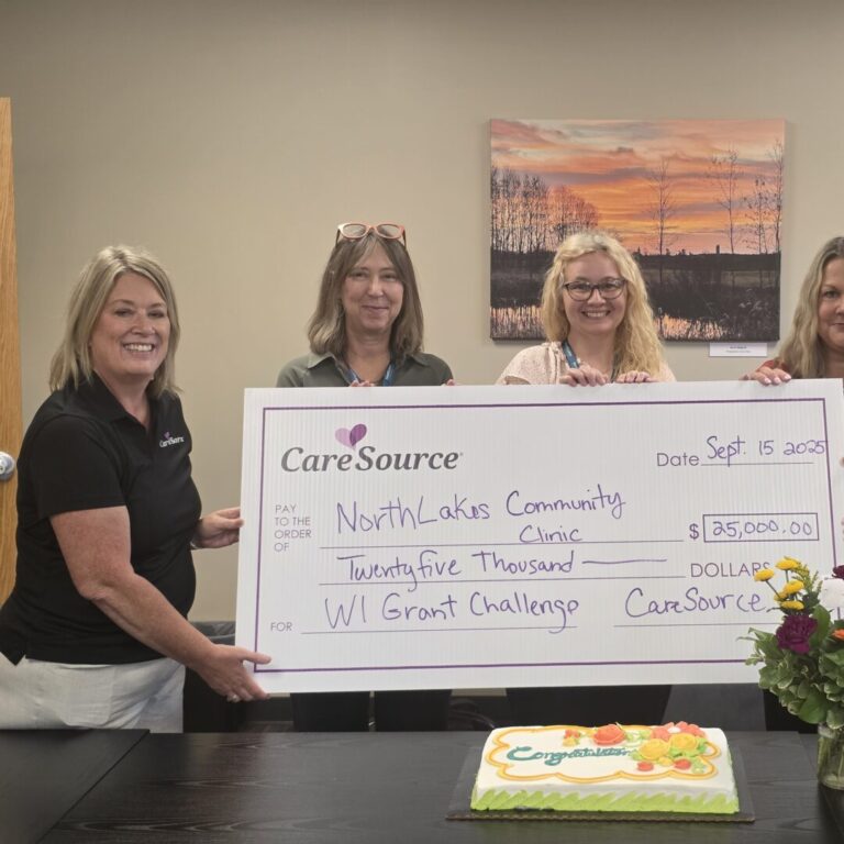 Caresource2 group of women holding large check